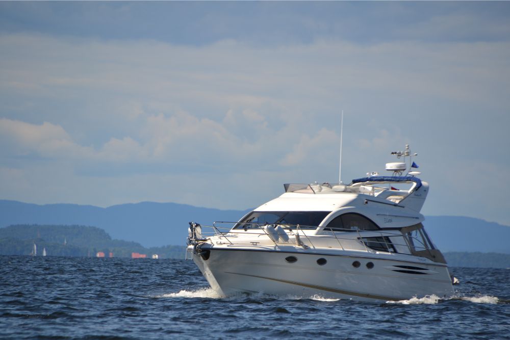 Boat Insurance coverage for luxury yacht on open water, illustrating marine insurance protection for boat owners