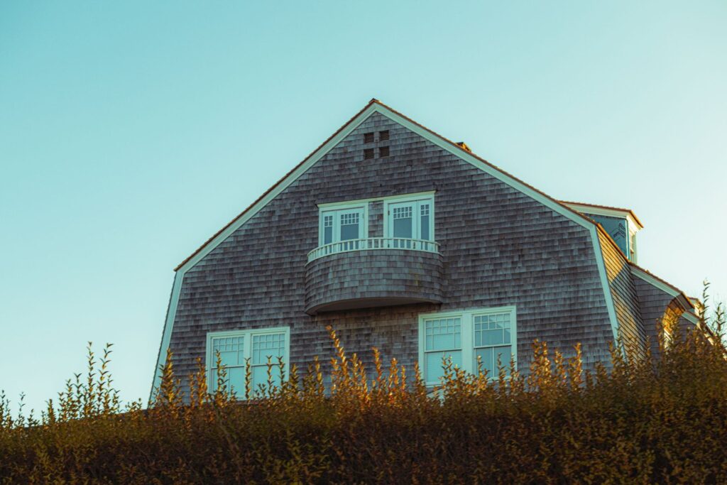 Gray cedar-shingle home in coastal New England