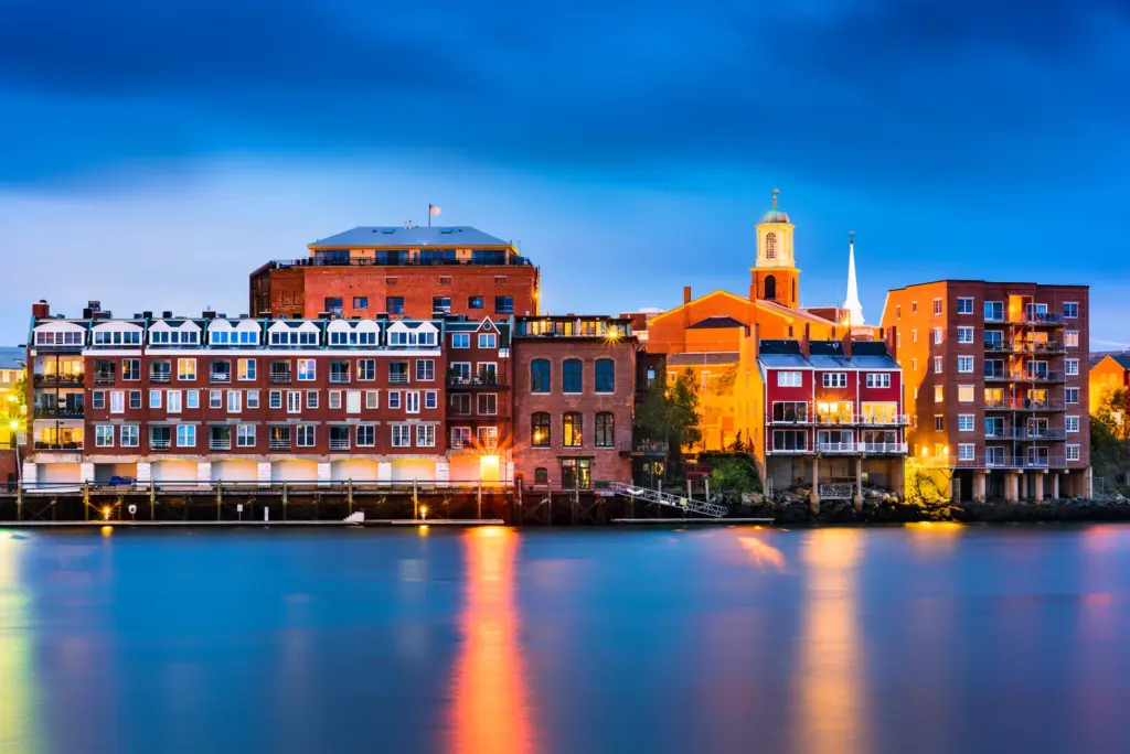Downtown Portsmouth, NH skyline across the Piscataqua River at dusk